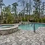 Lux Project 14 custom oasis pool with spa and waterfalls