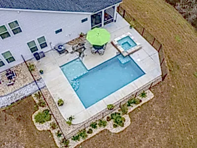 Lux Project 13 custom L shaped pool with spa