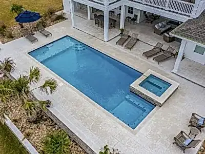 Lux Project 9 featuring a custom rectangular pool and spa